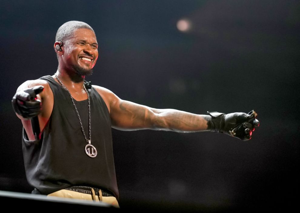 NEW ORLEANS, LOUISIANA - JULY 06: Usher performs onstage during Day 2 of the 2024 ESSENCE Festival of Culture presented by Coca-Cola at Caesars Superdome on July 06, 2024 in New Orleans, Louisiana.