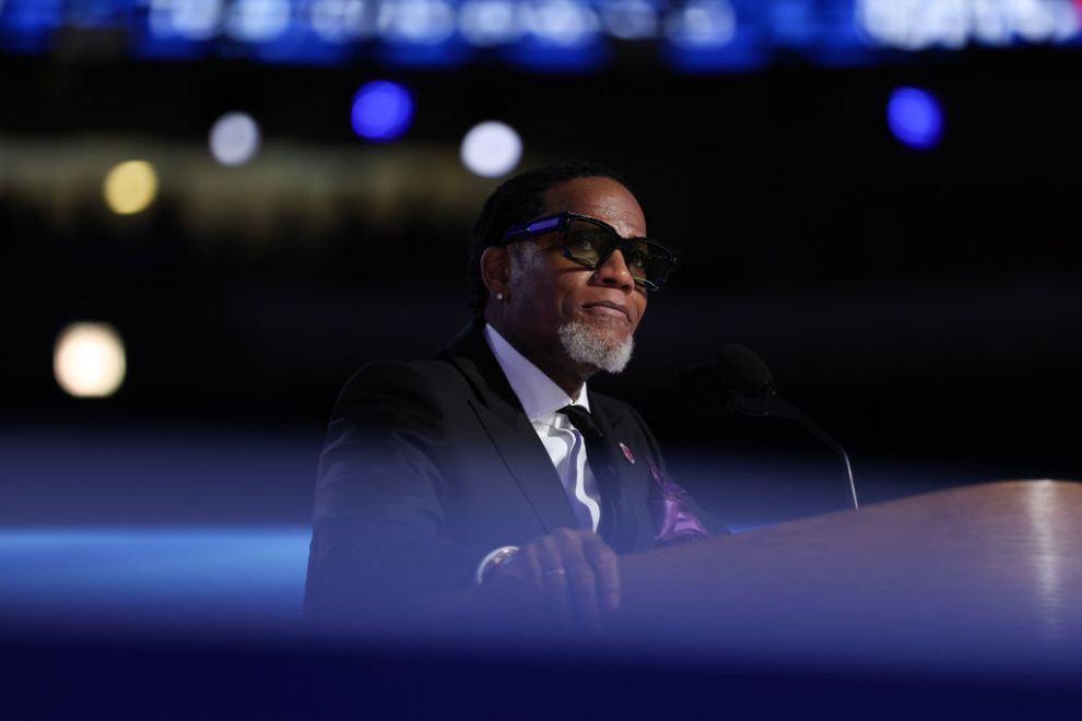 CHICAGO, ILLINOIS - AUGUST 22: Actor and comedian D.L. Hughley speaks onstage during the final day of the Democratic National Convention at the United Center on August 22, 2024 in Chicago, Illinois. Delegates, politicians, and Democratic Party supporters are gathering in Chicago, as current Vice President Kamala Harris is named her party's presidential nominee. The DNC takes place from August 19-22