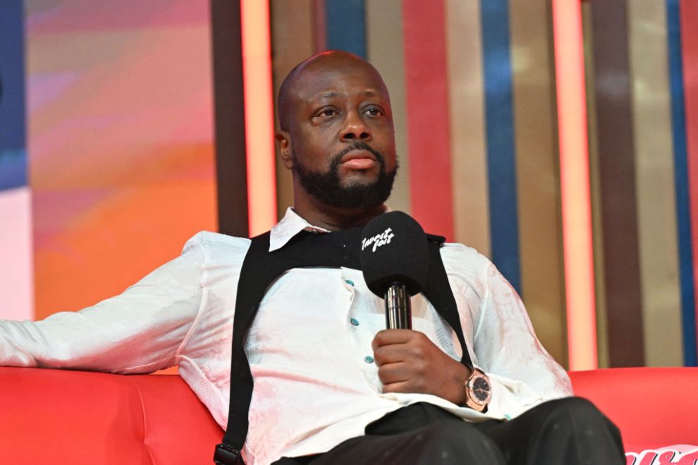 ATLANTA, GEORGIA - AUGUST 24: Recording artist Wyclef Jean speaks onstage during Day 2 of the 2024 Invest Fest at Georgia World Congress Center on August 24, 2024 in Atlanta, Georgia