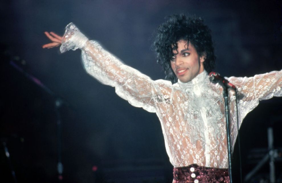 DETROIT, MI - NOVEMBER 4: American singer, songwriter, musician, record producer, dancer, actor, and filmmaker Prince (1958-2016) performs onstage during the 1984 Purple Rain Tour on November 4, 1984, at the Joe Louis Arena in Detroit, Michigan.